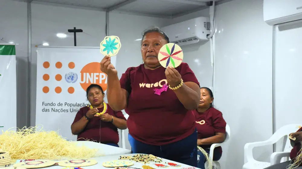 Migrantes e refugiadas celebram ancestralidade no Dia Internacional da Mulher em Pacaraima, Roraima